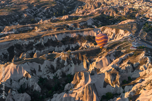 Nevsehir, Turkey. Colorful hot air balloon flying over Cappadocia, Turkey. Hot air balloons flying in sunrise sky.