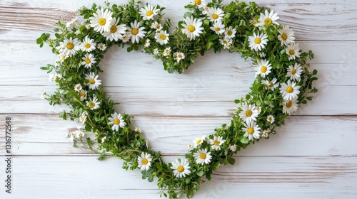 A beautiful heart shape crafted from vibrant green leaves and delicate daisies brings a sense of love and joy. Set against a rustic wooden surface, it evokes feelings of happiness and warmth