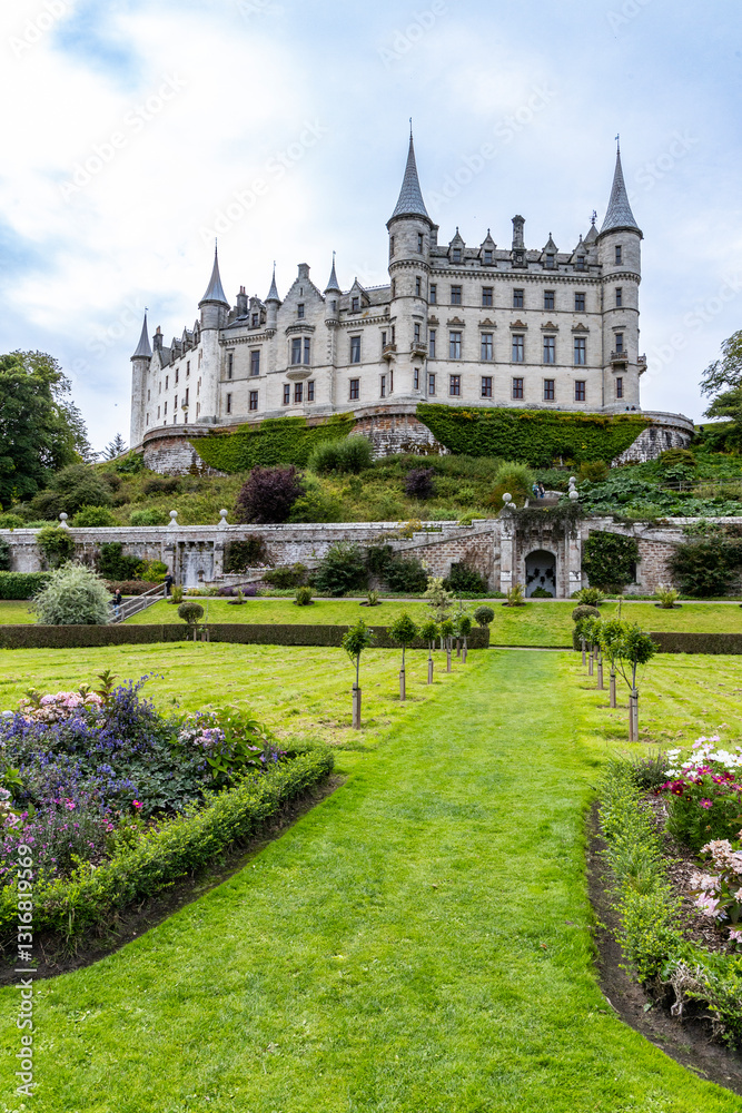 Dunrobin Castle, fairy-tale gem overlooking North Sea, offers breathtaking gardens, exquisite summer blooms. A masterpiece of elegance, lush landscapes meet historic charm, unfold on manicured lawns Dunrobin Castle, fairy-tale gem overlooking North Sea, offers breathtaking gardens, exquisite summer blooms. A masterpiece of elegance, lush landscapes meet historic charm, unfold on manicured lawns