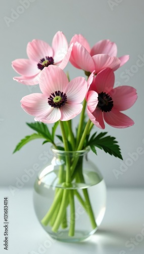 Wallpaper Mural Delicate anemone flowers in a clear glass vase, floral, pastel Torontodigital.ca