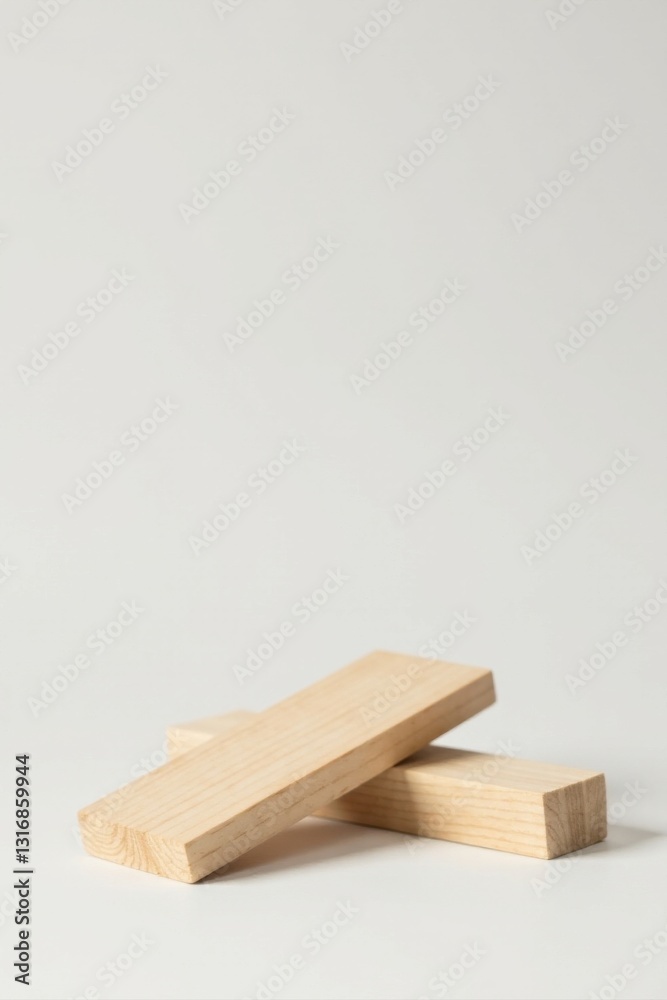 Two Light Wooden Blocks Resting on a White Surface A Minimalist Composition Featuring Simple, Unfinished Wood Two Light Wooden Blocks Resting on a White Surface A Minimalist Composition Featuring Simple, Unfinished Wood