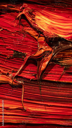 Lumpy texture of a red paint colour