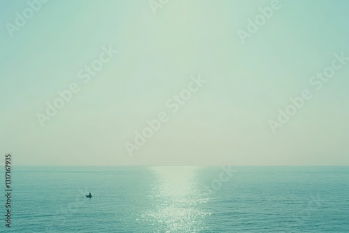 Solitary boat on a calm, serene ocean under a pale sky, conveying peace and solitude.