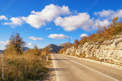 Balkan road trip.  Road in Dinaric Alps on sunny autumn day. Bosnia and Herzegovina, Republika Srpska
