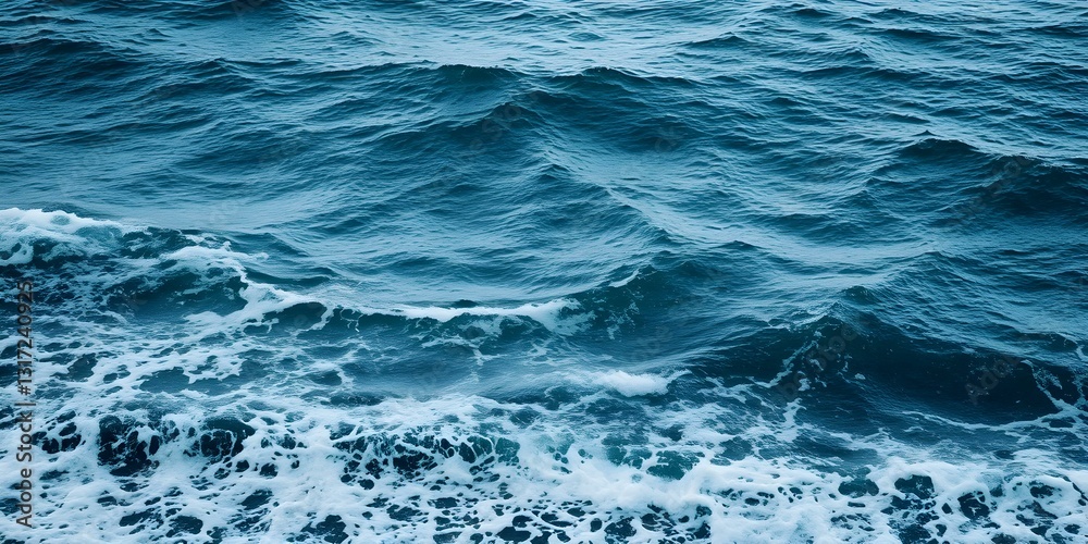 Oceanic Rhapsody: A captivating view of the boundless ocean, with its waves in motion. The dark, teal hue of the water creates an ethereal atmosphere. The photograph showcases nature's raw beauty Oceanic Rhapsody: A captivating view of the boundless ocean, with its waves in motion. The dark, teal hue of the water creates an ethereal atmosphere. The photograph showcases nature's raw beauty