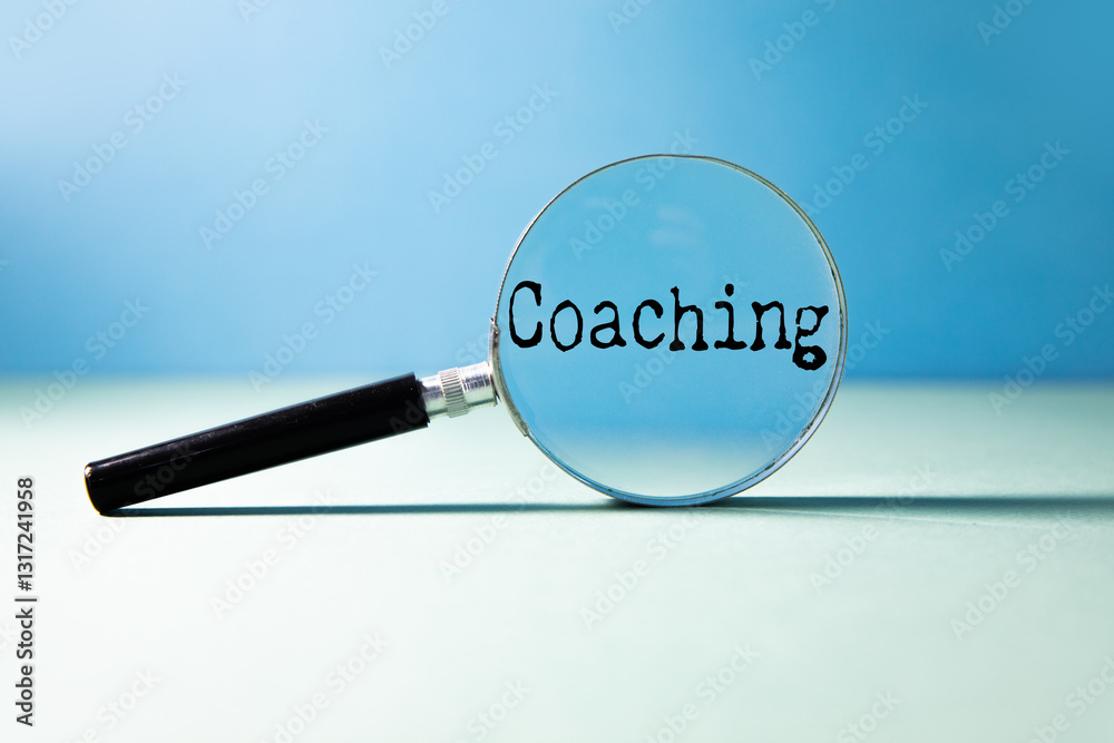 coaching concept with magnifying glass coaching concept with magnifying glass