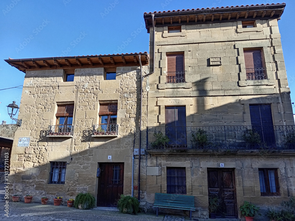 Traditional stone houses in a quiet street of Sajazarra, Spain Traditional stone houses in a quiet street of Sajazarra, Spain