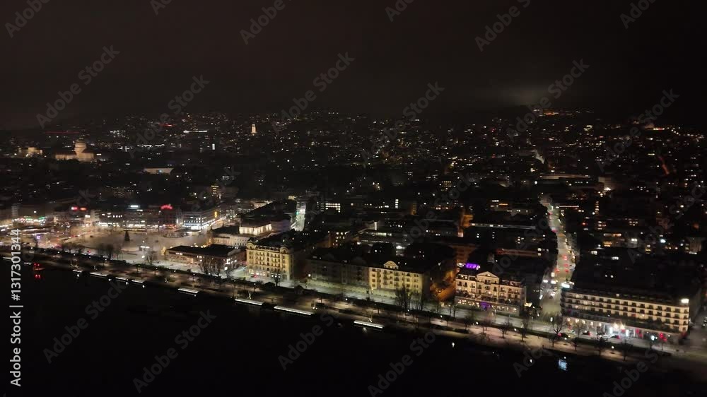 zurich night covering historic center town lake scene includes sechseläutenplatz central area switzerland’s banking hub aerial panning shot drone nighttime zurich night covering historic center town lake scene includes sechseläutenplatz central area switzerland’s banking hub aerial panning shot drone nighttime