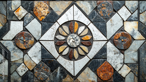 Stone Tile Floral Mosaic. A decorative stone tile mosaic featuring a central floral pattern surrounded by geometric shapes in varied colors and textures, ideal for backgrounds.