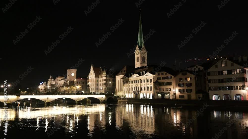 zurich's historical center lights night scene includes hotel church illuminated buildings bridge old town panning shot switzerland nighttime scenic glow vibrant atmosphere swiss charm zurich's historical center lights night scene includes hotel church illuminated buildings bridge old town panning shot switzerland nighttime scenic glow vibrant atmosphere swiss charm