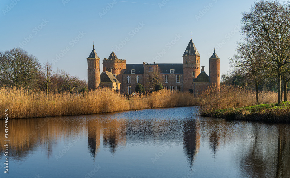 Fototapeta premium Domburg, Province Zeeland, Netherlands – March 03, 2025 - Westhove Castle, located in the nature reserve de Manteling near Domburg