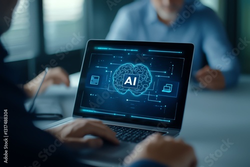 A close-up of a laptop displaying ai artificial intelligence graphics during a collaborative meeting