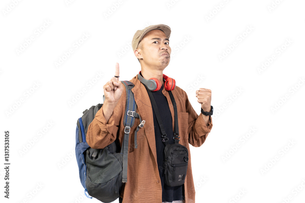 Young Indonesian male traveler looking disappointed and angry while traveling, travel concept, isolated on white background. Young Indonesian male traveler looking disappointed and angry while traveling, travel concept, isolated on white background.