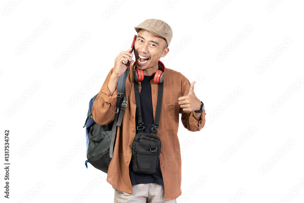 Excited young Indonesian man giving thumbs up to camera, travel concept, isolated on white background. Excited young Indonesian man giving thumbs up to camera, travel concept, isolated on white background.
