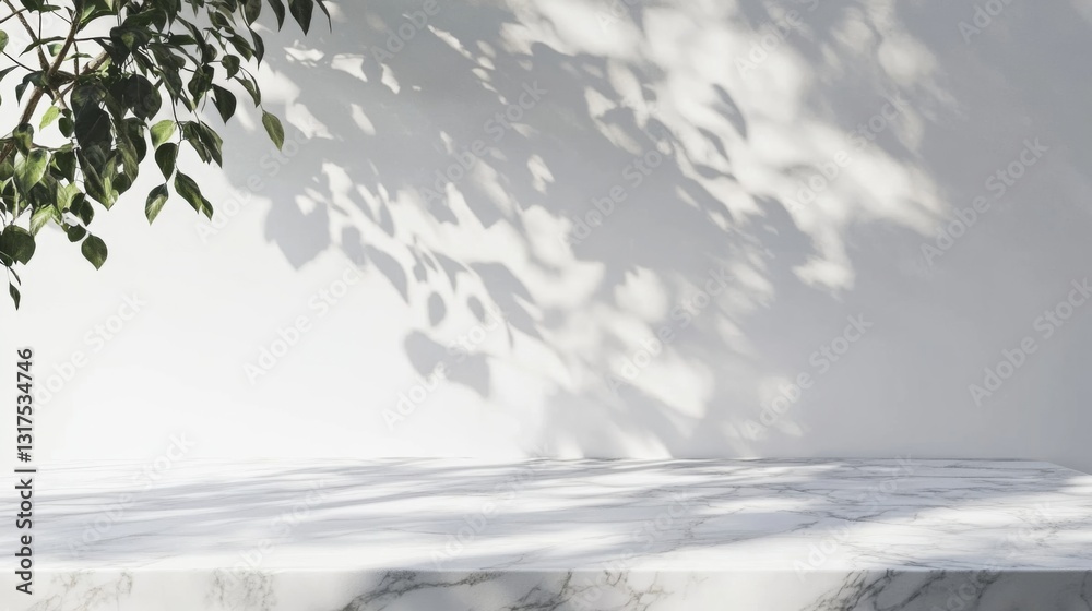 Fototapeta premium Marble table with tree shadow drop on white wall background for mockup product display 