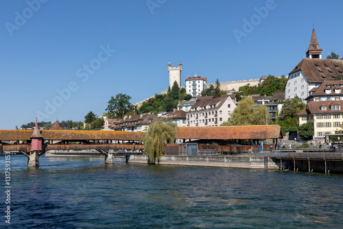 lucerne switzerland spreuer bridge city wall and riverfront of the reuss river sunny day photo