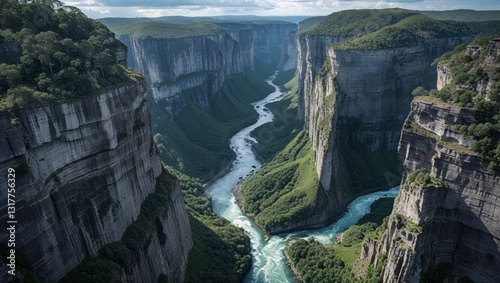 A breathtaking view of a lush canyon with a winding river surrounded by towering cliffs.