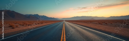Long empty asphalt road extends through barren landscape framed by mountains under bright blue sky twilight. Desert landscape solitude, exploration journey. Scenic drive with calmness. Natural beauty