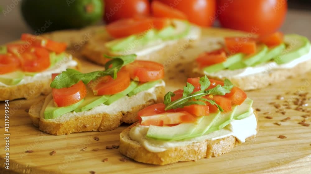 Tomatos and avocado on black table close up Video Tomatos and avocado on black table close up Video