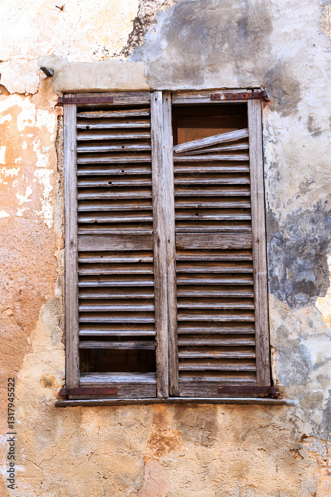 Europe, Spain, Balearic Islands, Mallorca. Wood shuttered window.