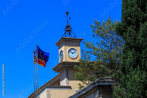 Obraz na płótnie Europe, Spain, Balearic Islands, Mallorca. Palma de Mallorca, flags and clock tower. w salonie