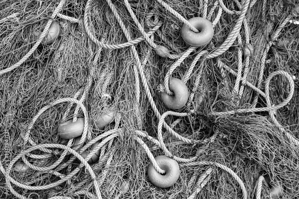 Europe, Spain, Balearic Islands, Mallorca, Santanyi, Cala Figuera . A small , colorful fishing harbor on S.E. corner of island. Fishing nets.