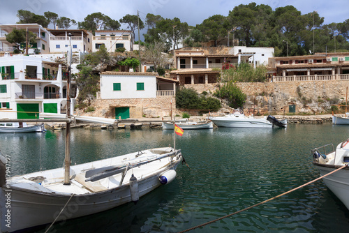 Obraz na płótnie Europe, Spain, Balearic Islands, Mallorca, Santanyi, Cala Figuera . A small , colorful fishing harbor on S.E. corner of island. Sailboat anchoring. 2017-04-16 w salonie