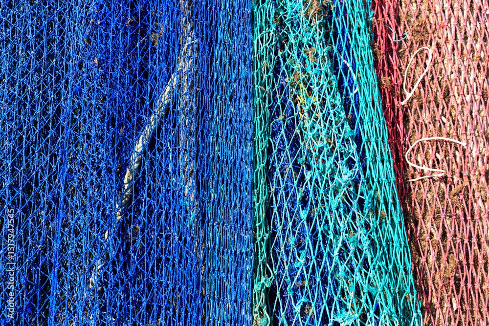 Europe, Spain, Balearic Islands, Mallorca, Santanyi, Cala Figuera . A small , colorful fishing harbor on S.E. corner of island. Fishing nets.