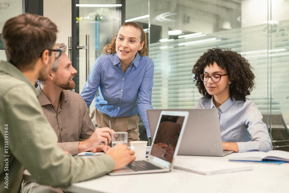 Business team discussing together business plans in office.
