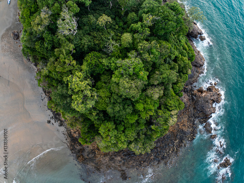 Bird eye view seashore with waves crashing on rock cliff,Beautiful waves sea surface in sunset time, Amazing seascape top view seacoast landscape view