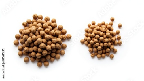 Obraz na płótnie 5mm and 3mm fish feed pellets. Two distinct sizes. White background. w salonie