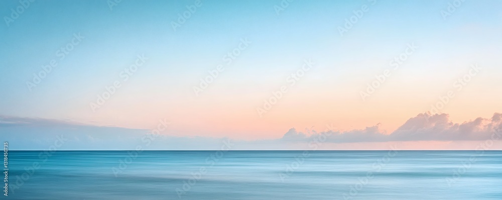 Obraz premium The calm ocean at sunrise meets a pastel sky