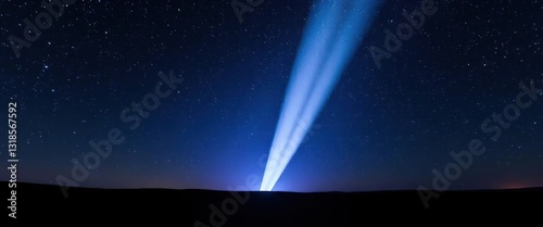 Piercing beam of light illuminates a star-studded night sky above a dark landscape, celestial,  dark night