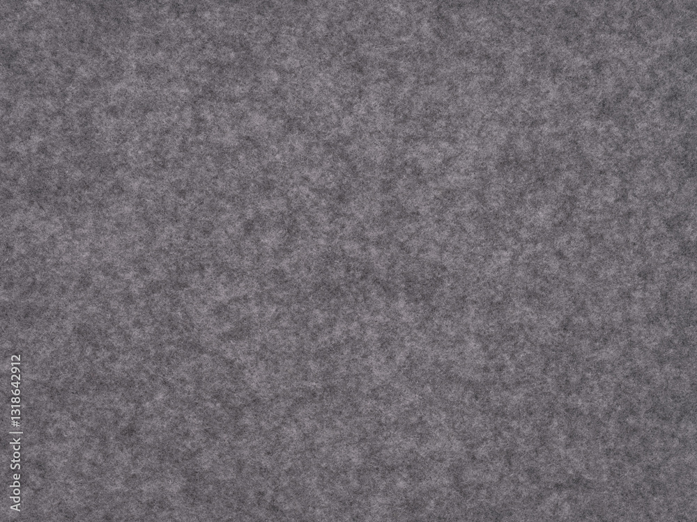 Fototapeta premium A slate gray felt canvas merges industrial grit with soft, tactile luxury, epitomizing modern urban sophistication