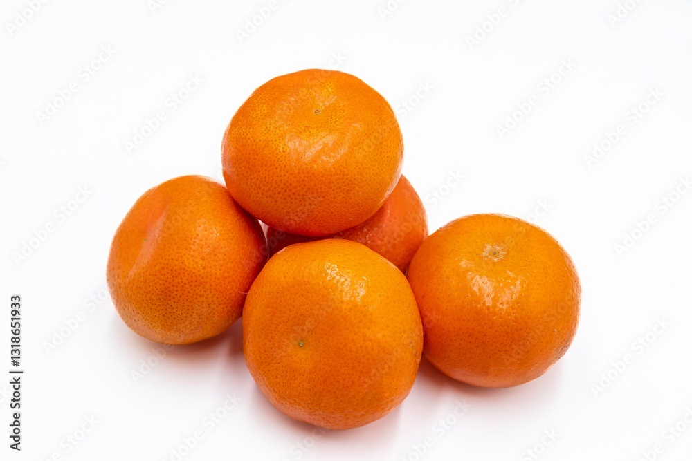 Ripe orange tangerines on a white background Ripe orange tangerines on a white background
