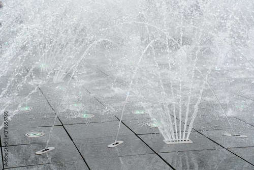 Obraz na płótnie The gush of water of a fountain w salonie