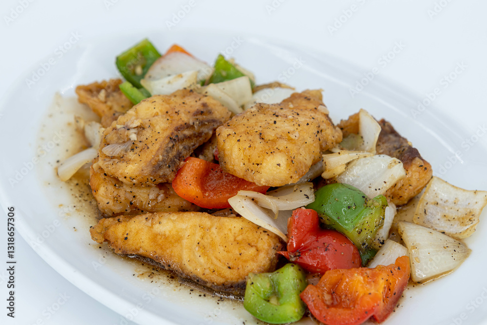 Sea Bass in black peppercorn, Stir fried Fish fillet with black pepper sauce, Stir Fried Sea Bass with Black Pepper. Boneless fish fried until crispy, stir-fried with sauce Sea Bass in black peppercorn, Stir fried Fish fillet with black pepper sauce, Stir Fried Sea Bass with Black Pepper. Boneless fish fried until crispy, stir-fried with sauce