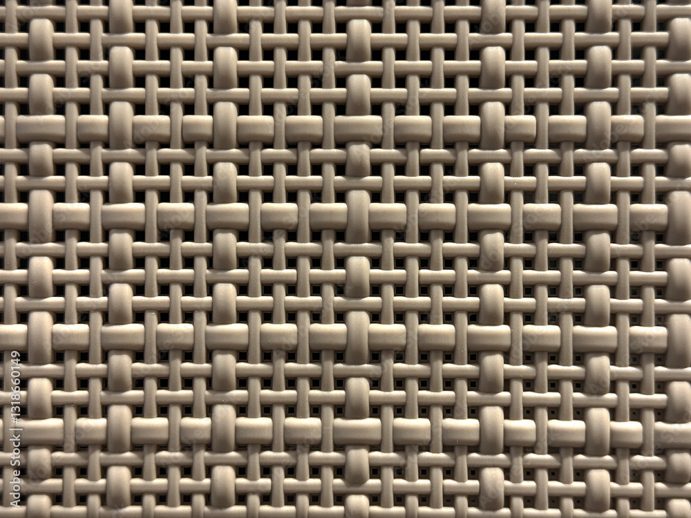 Close up of synthetic plastic rattan in weaving pattern. Close up molded plastic basket in brown color. Seamless background texture. Close up of synthetic plastic rattan in weaving pattern. Close up molded plastic basket in brown color. Seamless background texture.