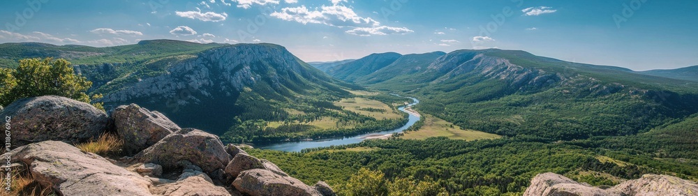 Beautiful panoramic view of rolling hills and winding river in a serene landscape during a sunny afternoon Beautiful panoramic view of rolling hills and winding river in a serene landscape during a sunny afternoon