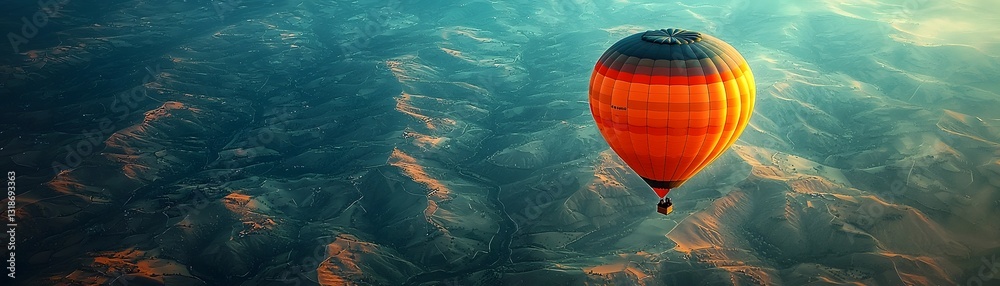 Obraz premium Majestic Hot Air Balloon Soaring Over Tranquil Rolling Hills Landscape