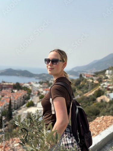 Coastal travel portrait of a woman by the sea, digital nomad and retreat vibe, blue water and island bay, summer vacation lifestyle, wellness slow travel and mindful escape, scenic background with cop