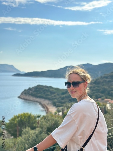 Coastal travel portrait of a woman by the sea, digital nomad and retreat vibe, blue water and island bay, summer vacation lifestyle, wellness slow travel and mindful escape, scenic background with cop