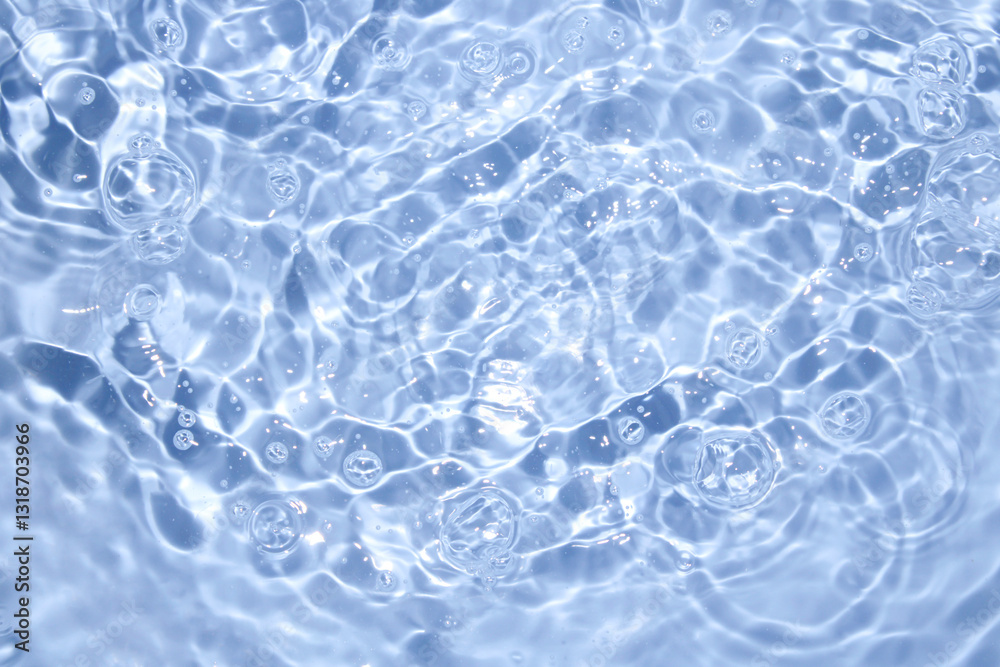 Calm and Clear Water Surface with Gentle Bubbles and Reflections