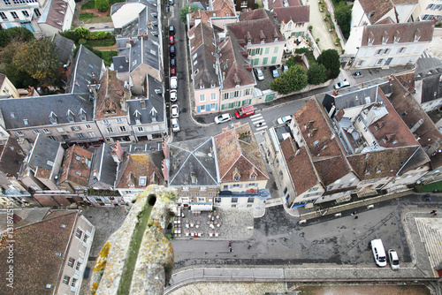 Fototapeta Naklejka Na Ścianę i Meble -  Views from above Chartres, revealing the bustling streets surrounding the cathedral