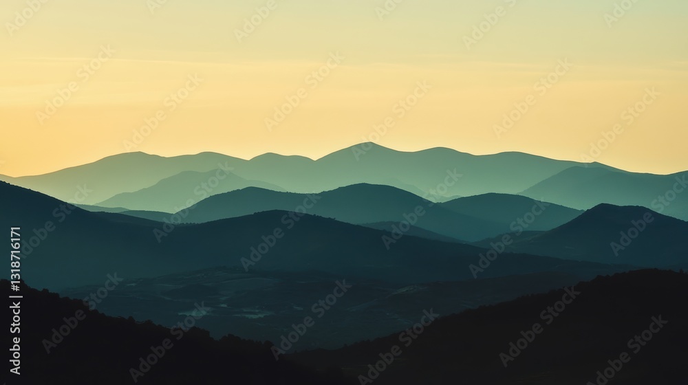 Fototapeta premium Serene sunset over rolling hills.