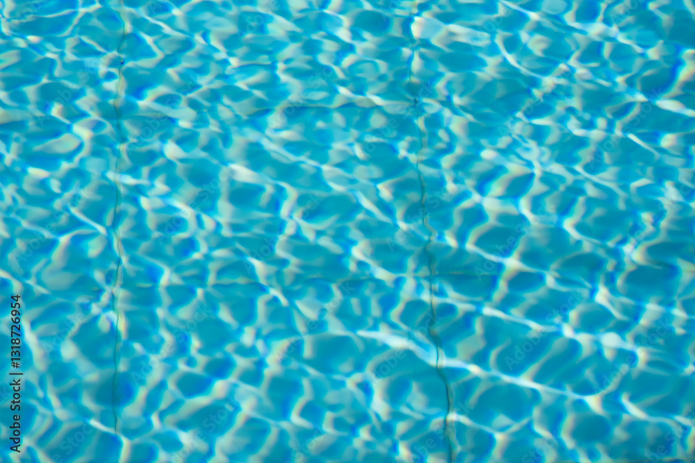 Blue water surface with intricate light reflections and rippling patterns, exuding summer vibes.. Blue water surface with intricate light reflections and rippling patterns, exuding summer vibes..