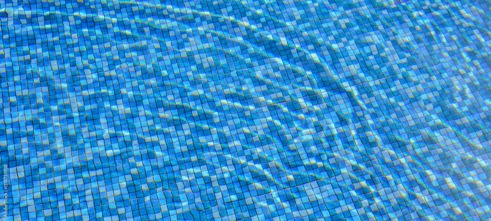 Swimming pool water surface and ripple wave with blue mosaic tiles