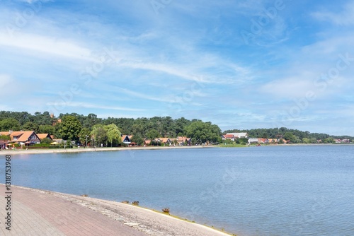 Fototapeta Naklejka Na Ścianę i Meble -  Nida, Neringa, Lithuania. July 19, 2024. Curonian sand-dune spit, separates the Curonian Lagoon from the Baltic Sea. UNESCO World Heritage Site. 