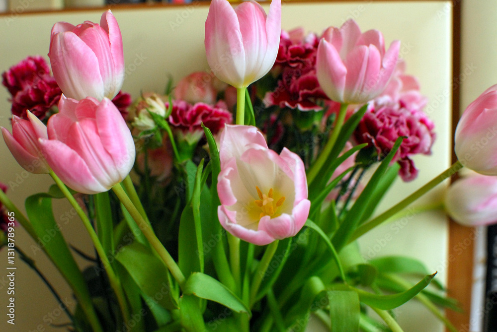 Fototapeta premium a bouquet of colorful roses and tulips