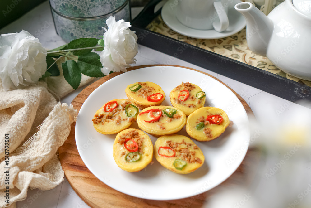 Traditional Malay cake known as Kuih Cara Berlauk. Traditional Malay cake known as Kuih Cara Berlauk.